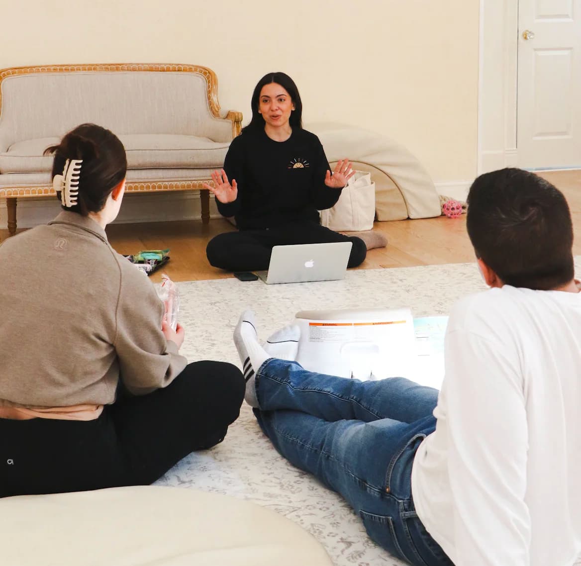 Jessica teaching parents about feeding techniques