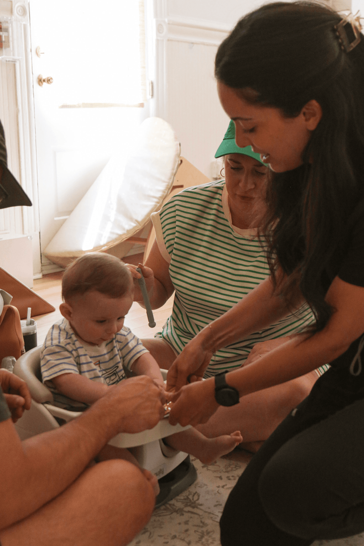 Jessica coaching a parent 1:1 during a starting solids session